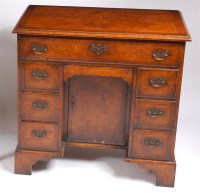 Lot 1178 - A walnut and figured walnut kneehole writing...