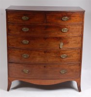 Lot 1189 - A Regency mahogany bowfront chest, of two...