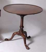 Lot 1194 - A George III mahogany tilt-top tripod table,...