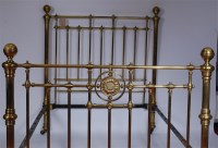 Lot 1198 - A late Victorian lacquered brass double...