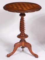 Lot 1119 - A mid-Victorian figured walnut pedestal games...