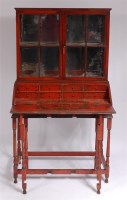 Lot 1164 - A red lacquered ladies bureau cabinet, in the...