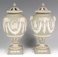 Lot 652 - A pair of Wedgwood green jasper pedestal vases...
