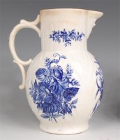 Lot 672 - A first period Worcester mask jug, blue and...