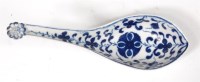 Lot 677 - A first period Worcester porcelain rice spoon,...