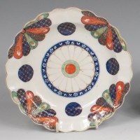 Lot 680 - A first period Worcester porcelain tea plate,...