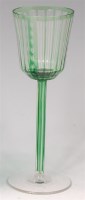 Lot 700 - A green cased and flash cut wine glass by Otto...