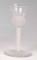 Lot 704 - A thistle shaped cordial glass, having double...