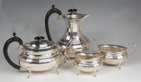 Lot 710 - A George V silver four piece tea and coffee...