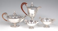 Lot 729 - A George V silver four piece tea and coffee...
