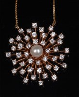 Lot 747 - An 18ct gold, pearl and diamond set pendant,...