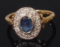 Lot 758 - An 18ct gold, sapphire and diamond cluster...
