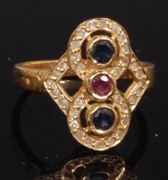 Lot 761 - An 18ct gold, ruby, sapphire and diamond set...