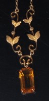 Lot 770 - A contemporary 9ct gold and citrine set...