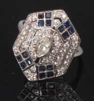 Lot 777 - An Art Deco style white metal, sapphire and...