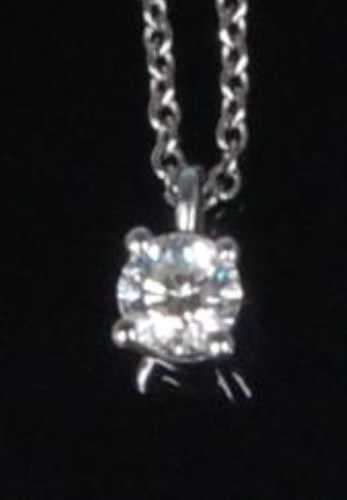 Lot 782 - A Tiffany & Co diamond pendant, the four claw...