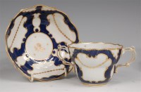 Lot 657 - A Worcester porcelain twin handled chocolate...
