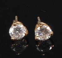 Lot 796 - A pair of 14ct gold and diamond ear studs, the...