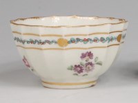 Lot 684 - A first period Worcester fluted tea bowl,...