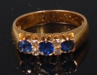 Lot 833 - An 18ct gold, sapphire and diamond dress ring,...
