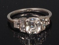 Lot 834 - An Art Deco platinum and diamond cluster ring,...