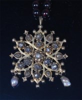 Lot 849 - A 19th century yellow metal diamond and pearl...