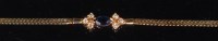 Lot 852 - A modern 14ct gold ladies bracelet, set with a...