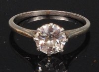 Lot 855 - A white metal and diamond solitaire ring, the...