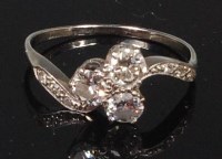 Lot 856 - An 18ct white gold and diamond three stone...