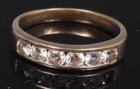 Lot 857 - An 18ct white gold and diamond set dress ring,...