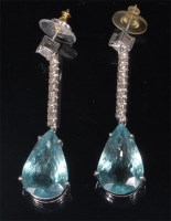 Lot 868 - A pair of white metal, diamond and aquamarine...