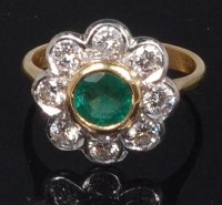 Lot 889 - An 18ct gold, emerald and diamond flower head...