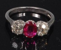 Lot 890 - A platinum, ruby and diamond dress ring,...