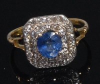 Lot 902 - An 18ct gold, sapphire and diamond dress ring,...