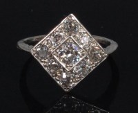 Lot 903 - An Art Deco white metal and diamond dress ring,...