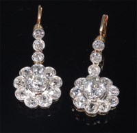 Lot 788 - A pair of yellow metal and diamond ear...