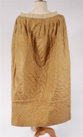 Lot 911 - A Victorian quilted silk underskirt, with tuck...