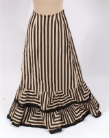 Lot 919 - A circa 1900 cotton sateen skirt, printed in a...