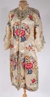 Lot 924 - A late 19th century Chinese silk gown, finely...