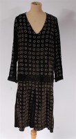 Lot 925 - A 1920s black silk velvet lightweight dress,...