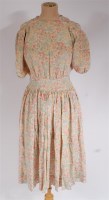 Lot 926 - A 1930s printed silk tea dress, with folk...