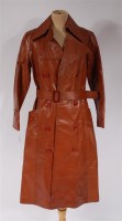 Lot 928 - A 1970s Louis Barnett tan leather full length...