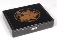 Lot 982 - An Art Deco silver and black enamel compact by...