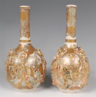 Lot 1005 - A pair of Japanese Meiji period satsuma bottle...