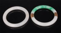 Lot 1013 - A Chinese white jade bangle, 8.1cm (hairline);...