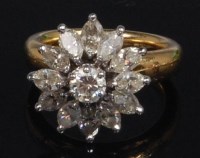 Lot 904 - An 18ct gold coronet diamond cluster ring, the...