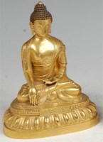 Lot 1030 - A Chinese finely cast gilt bronze Buddha,...