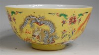 Lot 1039 - A Chinese porcelain yellow ground bowl, the...