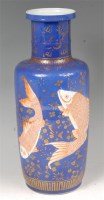 Lot 1044 - A Chinese glazed stoneware Rouleau fish vase,...