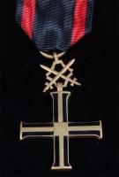 Lot 328 - A Polish Cross of Independence with swords.